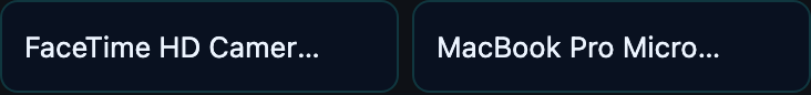 Device row in the studio top-bar showing Camera / Microphone select dropdowns.