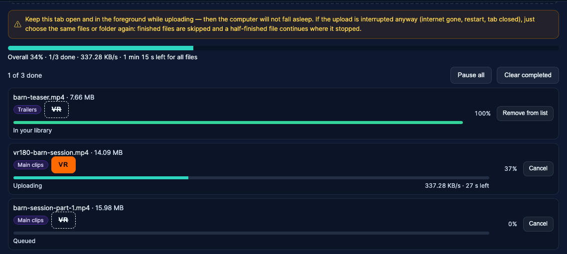 The upload queue: a finished trailer, one file uploading with speed and time left, one queued, and the Overall bar.